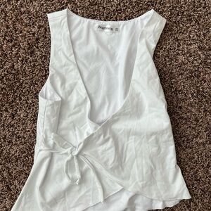 Beginning Boutique White Sleeveless Wrap Blouse